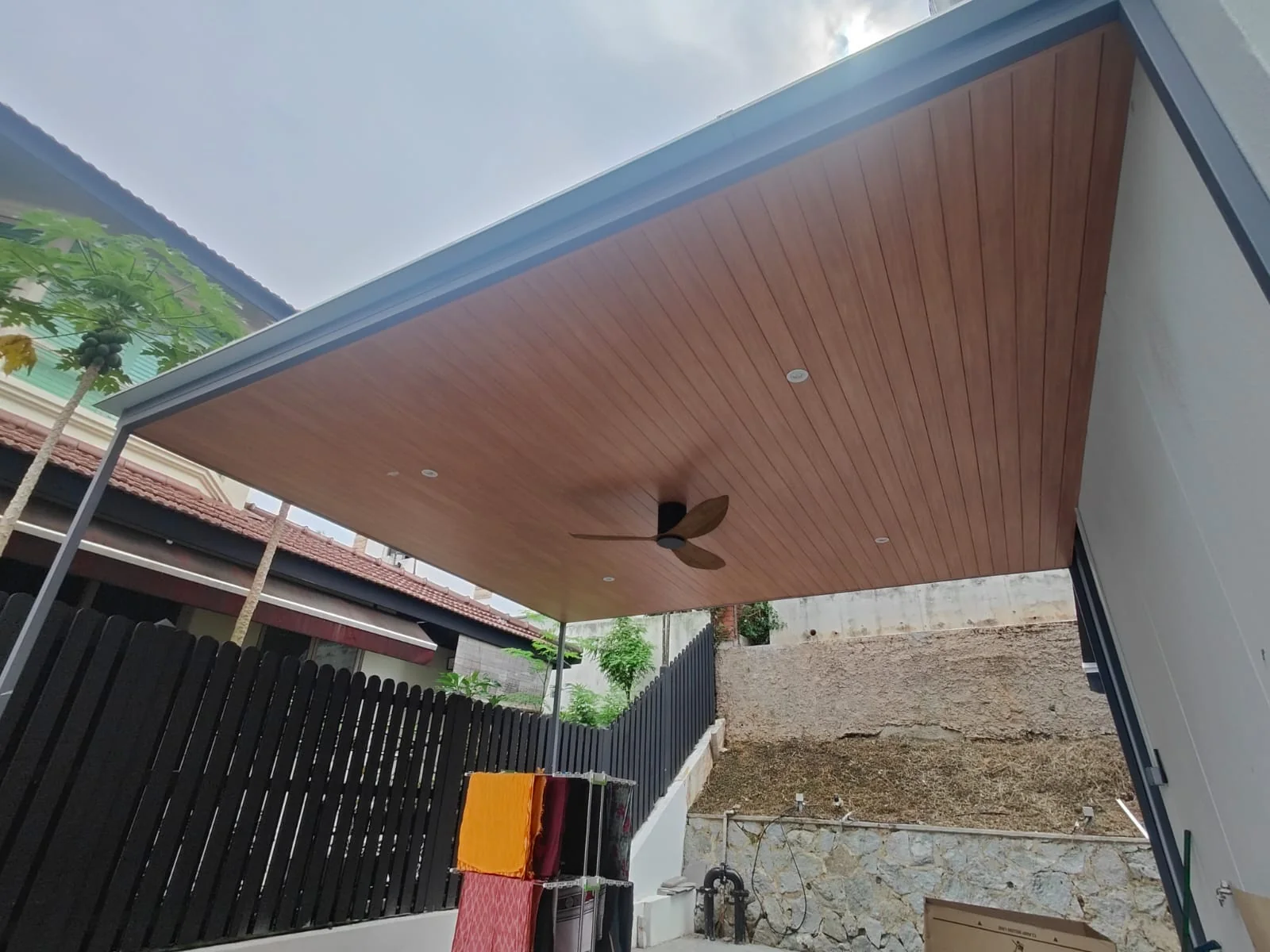 Carport, side lane, aluminium composite panel roofing installed by Exterior Design in Singapore