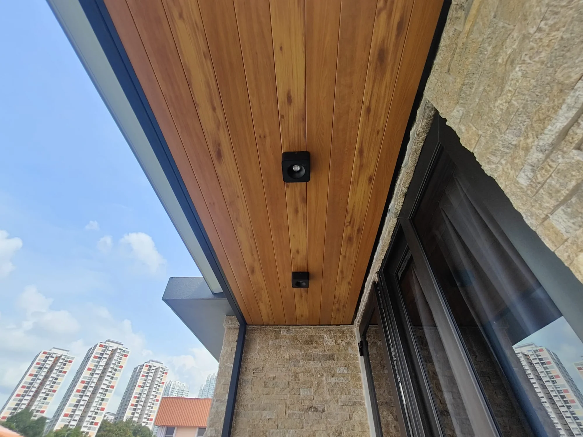 Ceiling with a blind, aluminium composite panel roofing installed by Exterior Design in Singapore